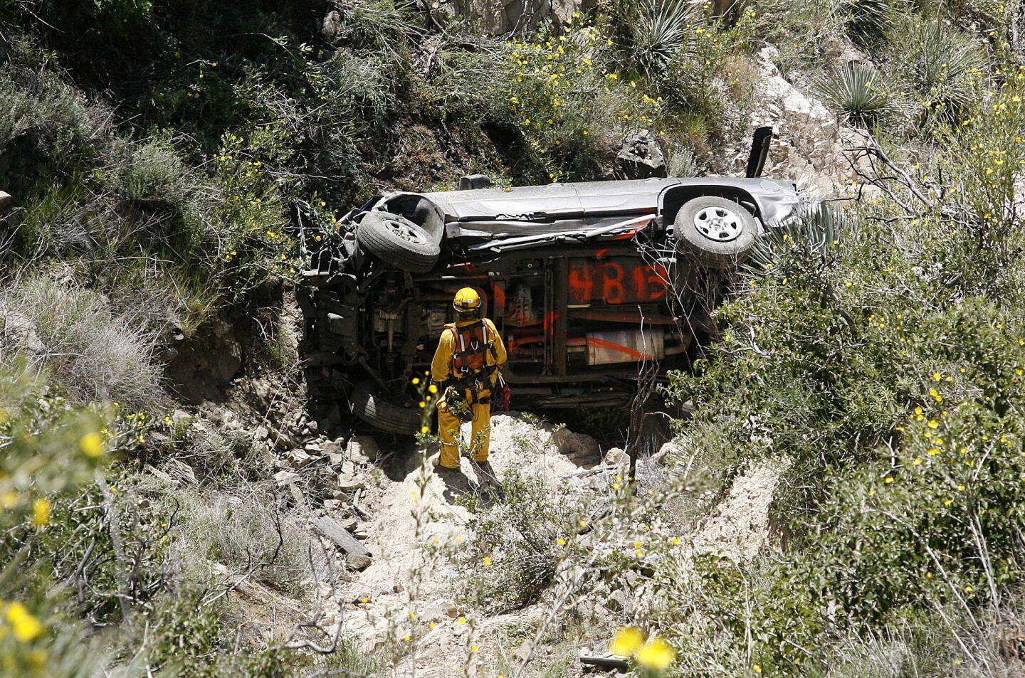 Photo Gallery: Vehicle found over the edge in Angeles National Forest