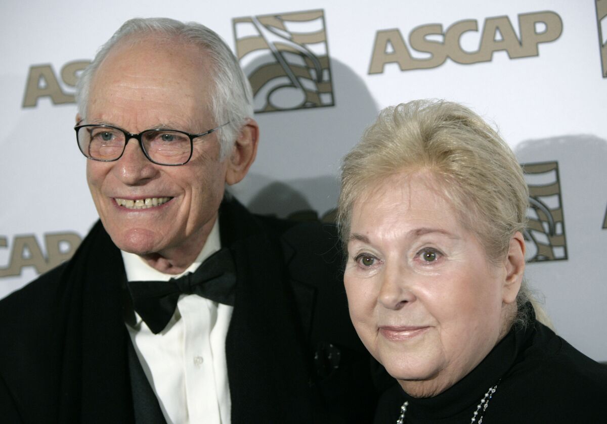 FILE - Honorees Alan, left, and Marilyn Bergman arrive at the ASCAP Film and Television music awards in Beverly Hills, Calif. on Tuesday, May 6, 2008. Oscar-winning lyricist Marilyn Bergman died Saturday, Jan. 8, 2022 at age 93. She teamed with husband Alan Bergman on “The Way We Were,” “How Do You Keep the Music Playing?” and hundreds of other songs. (AP Photo/Matt Sayles, File)