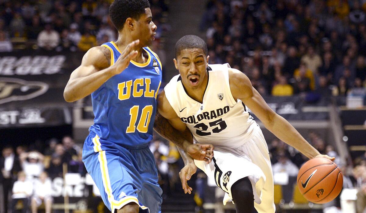 Colorado's Spencer Dinwiddie, driving against UCLA's Larry Drew as a sophomore, helped the Buffaloes open last season 14-2.