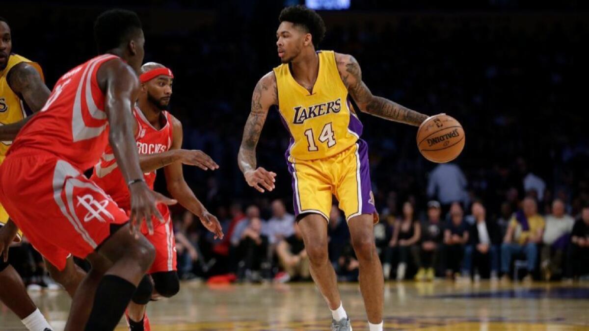 Lakers forward Brandon Ingram, shown handling the ball against the Houston Rockets on Oct. 26, says he has was just being cautious when he left a game against the Utah Jazz.