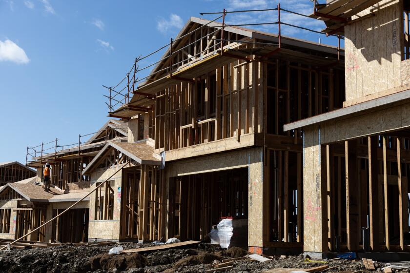 Single-family homes under construction at KB Home’s Ridgeview housing complex at San Marcos on Monday, Feb. 13, 2023. The homes are selling for over $1 million.