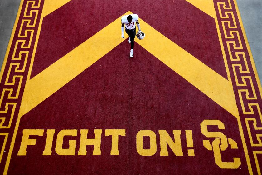 A Washington State football player walks in the tunnel of the area during their USC on Sept. 21, 2018.