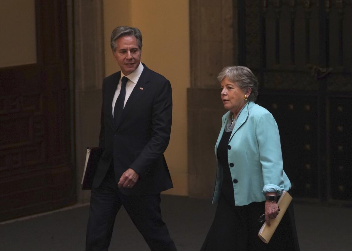 U.S. Secretary of State Antony Blinken, left, and Mexican Secretary of Foreign Affairs Alicia Brcena walk together during a meeting on security, at the National Palace in Mexico City, Thursday, Oct. 5, 2023. (AP Photo/Marco Ugarte)