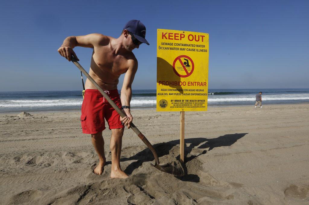 Dockweiler State Beach remained closed Thursday after medical waste, including hypodermic needles, was found along the shoreline.