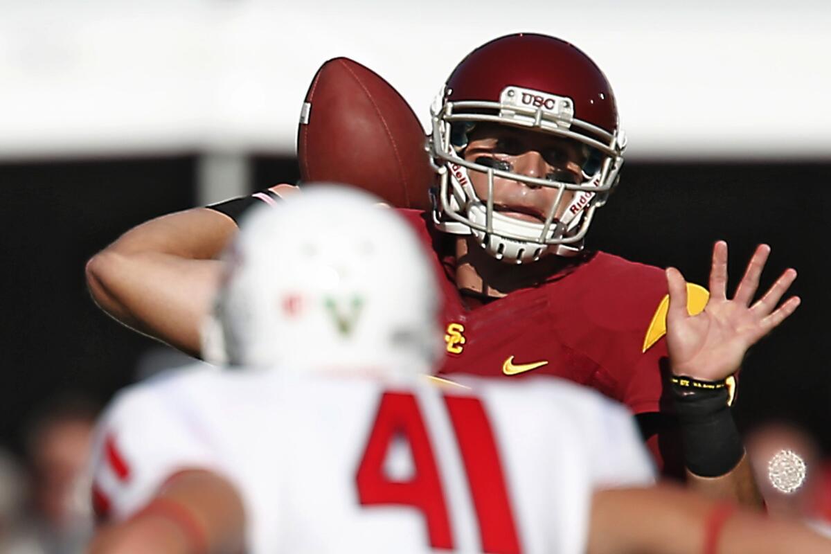 USC quarterback Cody Kessler throws a pass downfield during the Trojans' 52-13 win over Fresno State. Kessler completed 25 of 37 passes for 394 yards and four touchdowns.