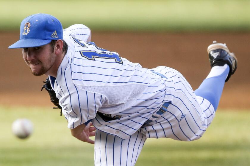 UCLA pitcher Grant Watson delivers against San Diego during the first inning.