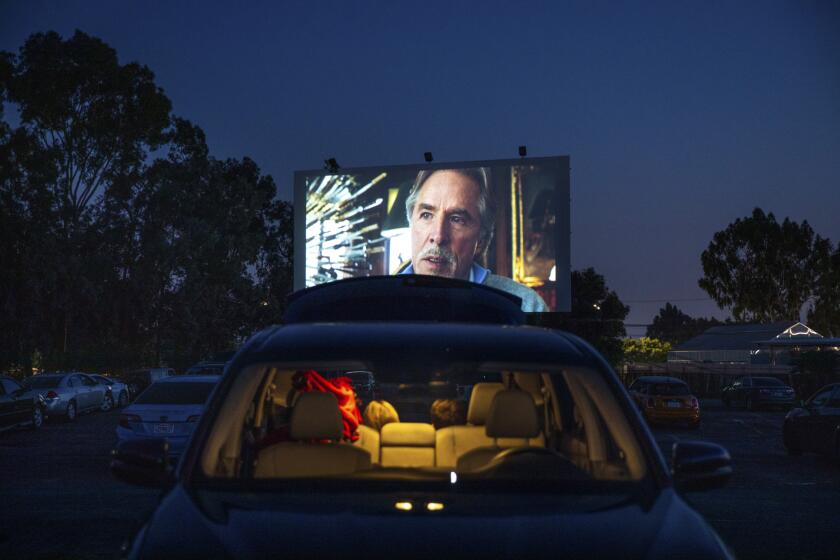MONTCLAIR, CA - APRIL 30: A scene from “Knives Out,” with actor Don Johnson, seen at the Mission Tiki Drive-in Theatre, in Montclair, CA, photographed Thursday, April 30, 2020, during the coronavirus pandemic. Originally opened with onea screen in 1956, the Mission Tiki expanded to four screens in 1975 and began renovation in 2006, updating to FM transmitters and digital projectors and repaved the property. The Mission Tiki has also been hosting a swap meet on weekends since the 60s, but with the coronavirus pandemic, has had to temporarily close. (Jay L. Clendenin / Los Angeles Times)