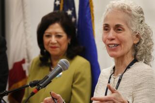 LOS ANGELES, CA - May 1, 2018: Dr. Barbara Ferrer, PhD, MPH, MEd, right, recently appointed the new Los Angeles County public health director by the Los Angeles County Board of Supervisors at a press conference on May 1, 2018 for the Los Angeles Reproductive Health Equity Project for Foster Youth (LA RHEP), funded by the Conrad N. Hilton Foundation which is a new public-private partnership serving LA County and constituents. LA RHEP brings together County departments, foster youth, and the agencies that serve them to promote evidence-informed strategies that reduce unplanned pregnancies and dismantle systemic barriers to health education and services for youth in foster care. Last year, Supervisor Solis, joined by Supervisor Sheila Kuehl, introduced a motion directing County departments to align with and participate in LA RHEP. The goal is to dramatically reduce unintended pregnancy rates for youth in care over the next ten years. (Al Seib / Los Angeles Times)