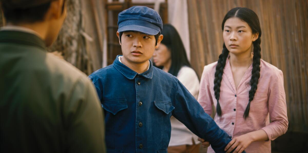 Ming Wang at 14 (Ben Wang) and Lili (Sara Ye) in "Sight."