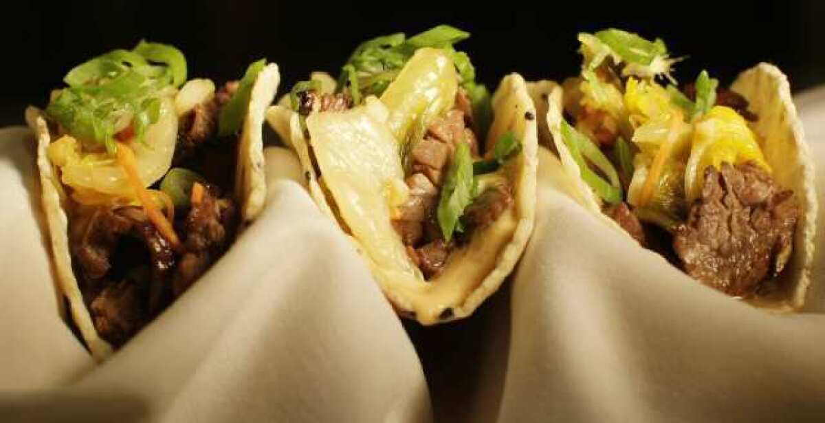 Korean tacos are among the small plates and snacks that chains such as Cheesecake Factory and California Pizza Kitchen are serving to nab "grazing" consumers.