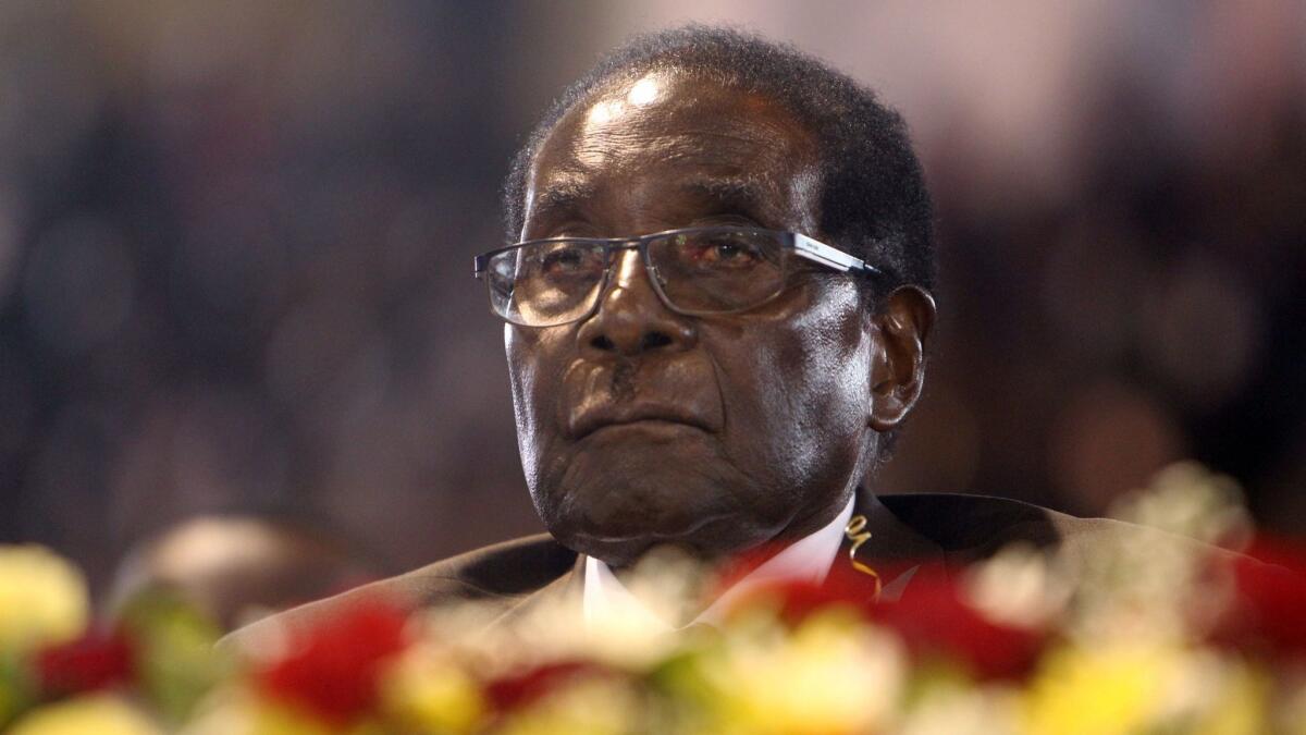 Zimbabwean President Robert Mugabe attends a meeting with the country's war veterans in Harare on April 7, 2016.