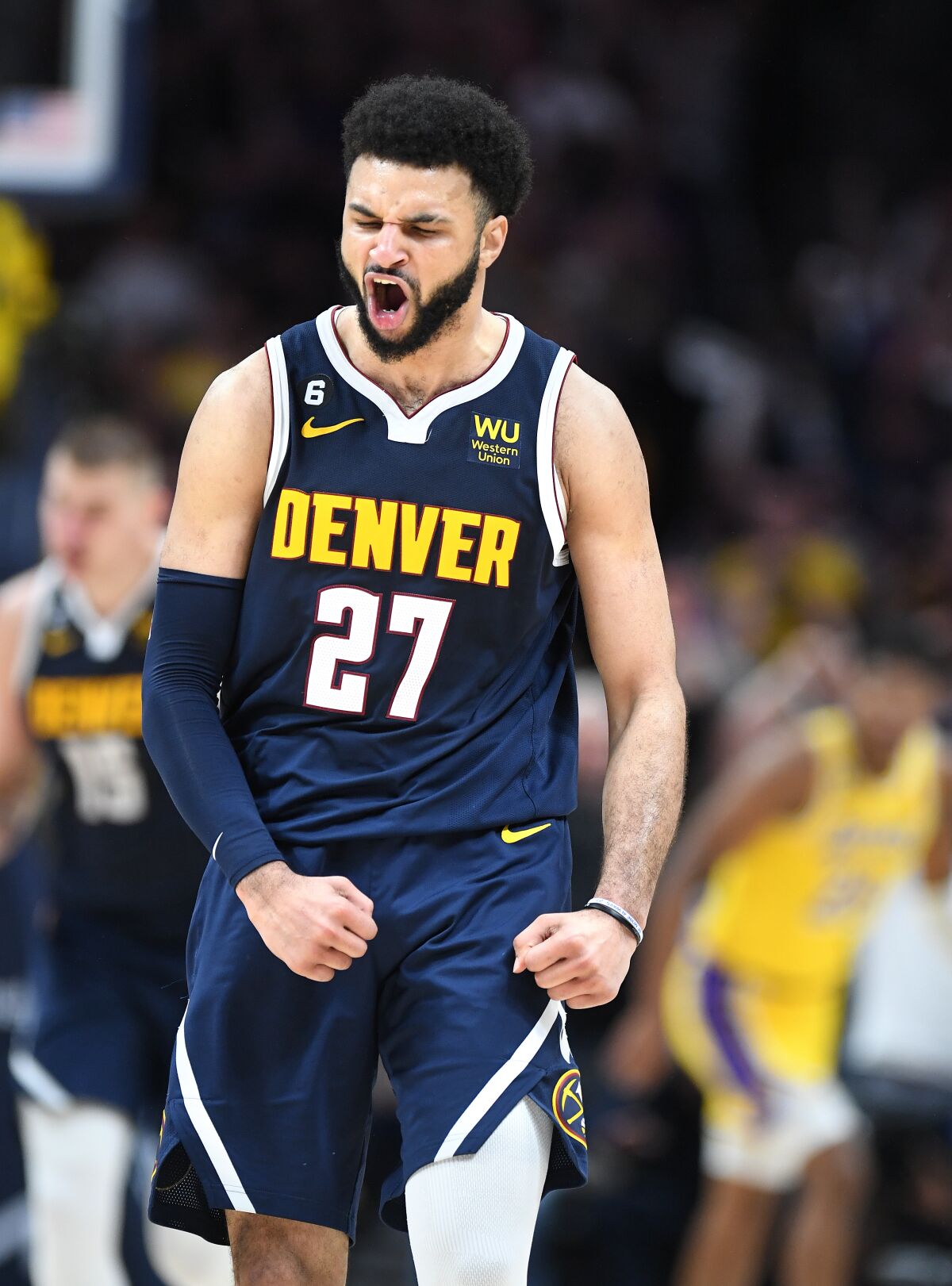 Denver Nuggets guard Jamal Murray celebrates after hitting a three-pointer in the fourth quarter of Game 2.