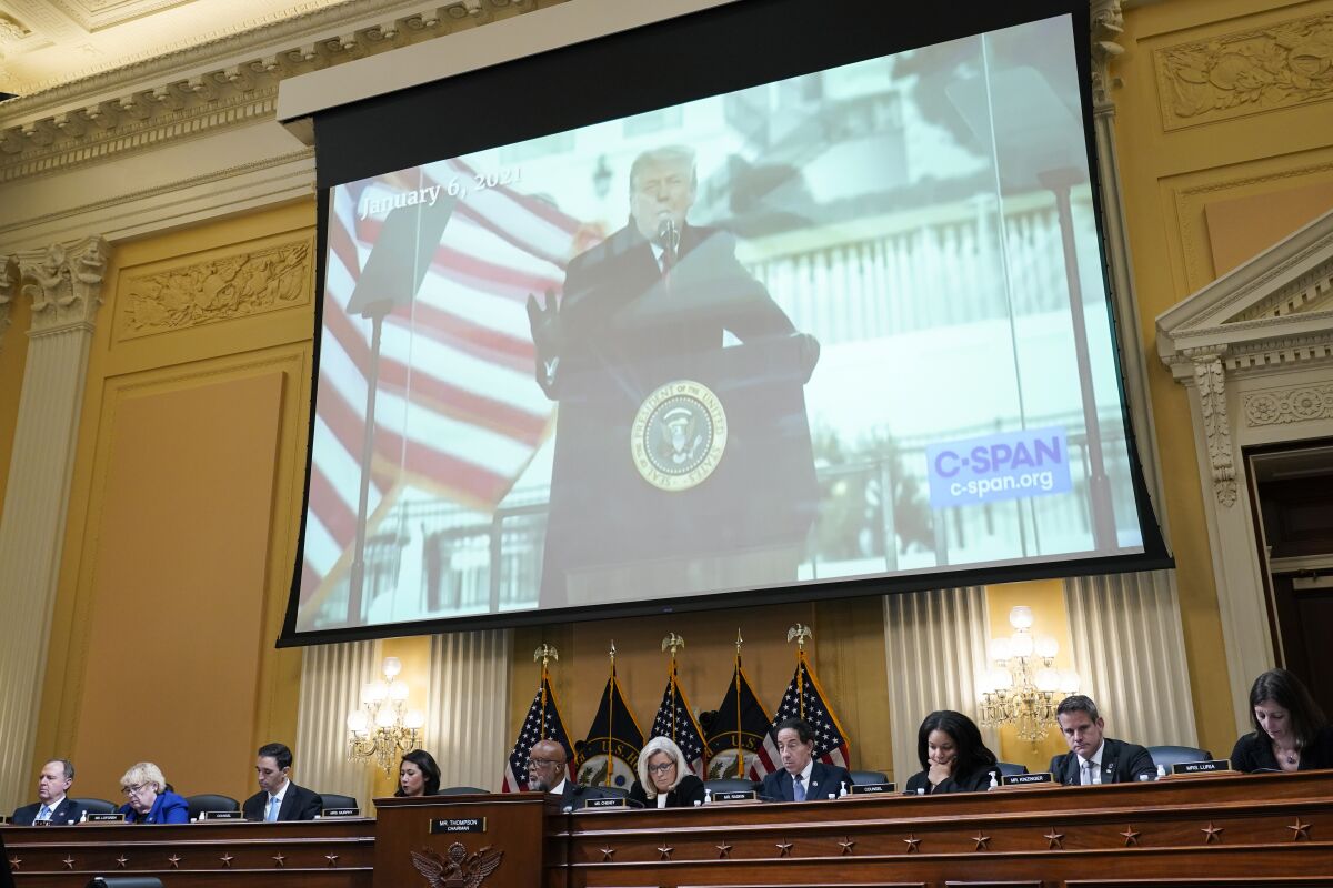 A video of then-President Donald Trump speaking is displayed as the House select committee investigating the Jan. 6 attack on the U.S. Capitol holds a hearing at the Capitol in Washington, Tuesday, July 12, 2022. (AP Photo/J. Scott Applewhite)