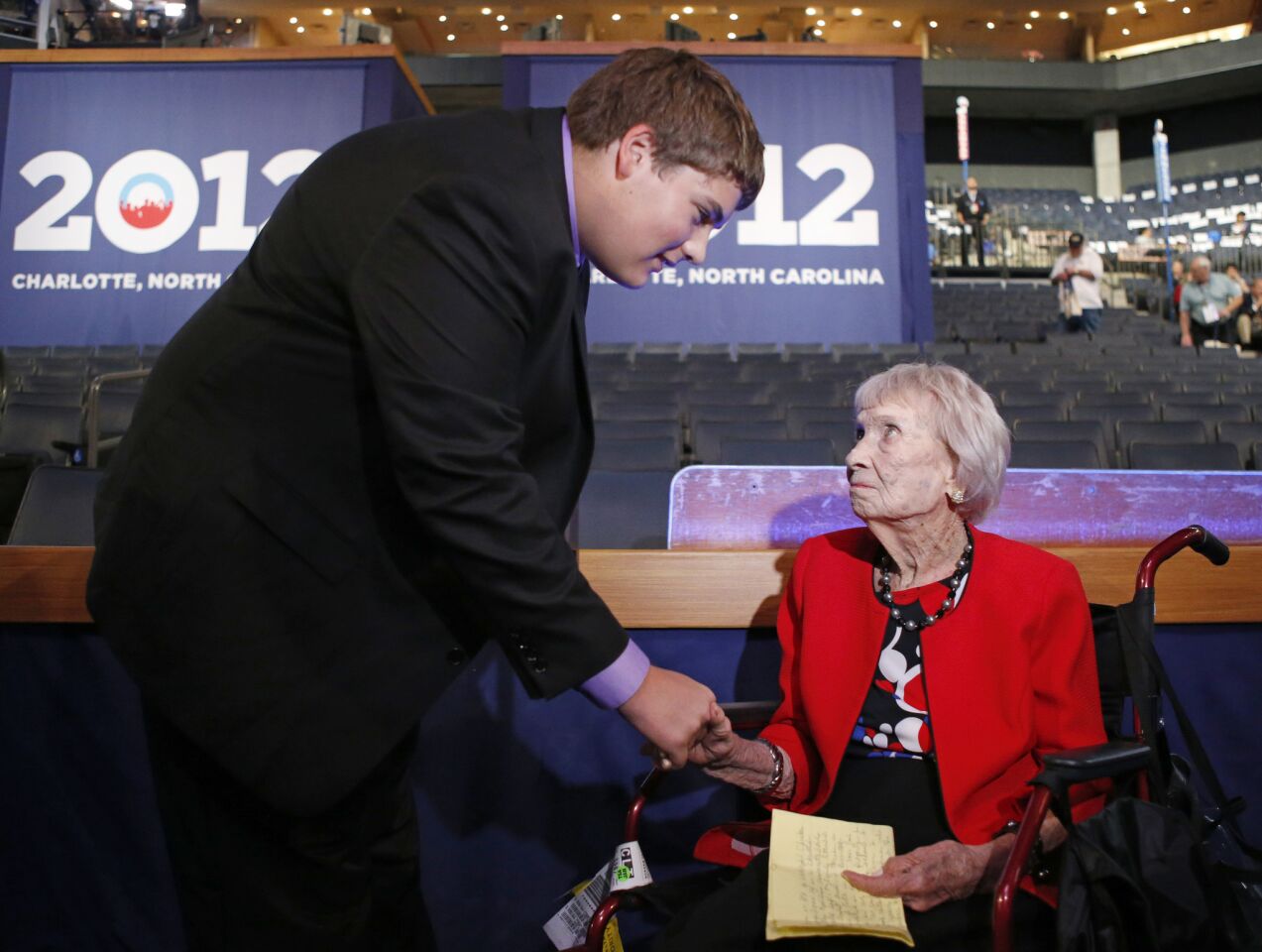 The youngest delegate Sam Gray, 17, from Marion, Iowa, meets the oldest delegate Elzena Johnson, 97, from Terry, Miss., at the Democratic National Convention in Charlotte, N.C.