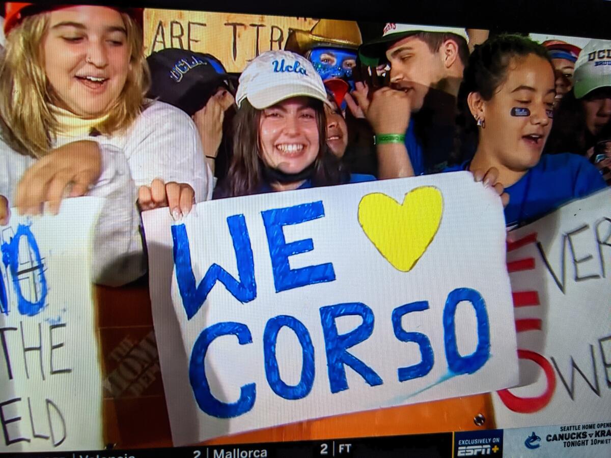 UCLA fans hold up signs during ESPN CollegeDay on Saturday.