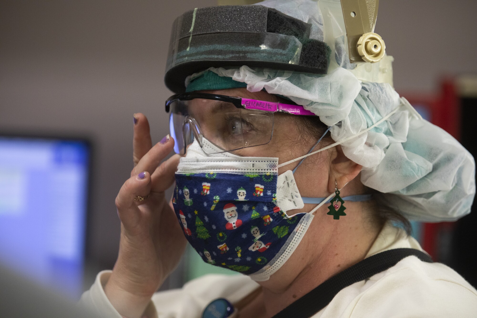 Nurse Elizabeth Waite begins to cry inside the ICU