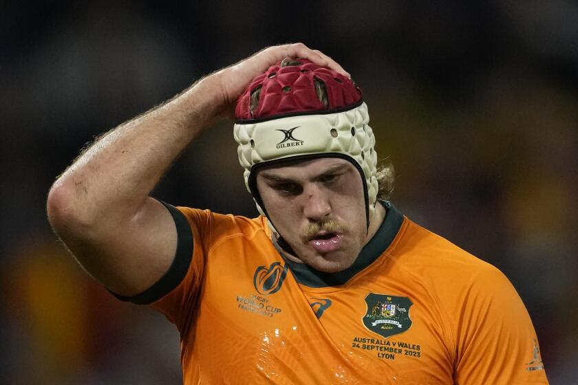 Australia's Fraser McReight reacts after the Rugby World Cup Pool C match between Wales and Australia at the OL Stadium in Lyon, France, Sunday, Sept. 24, 2023. Wales won the match 40-6. (AP Photo/Christophe Ena)
