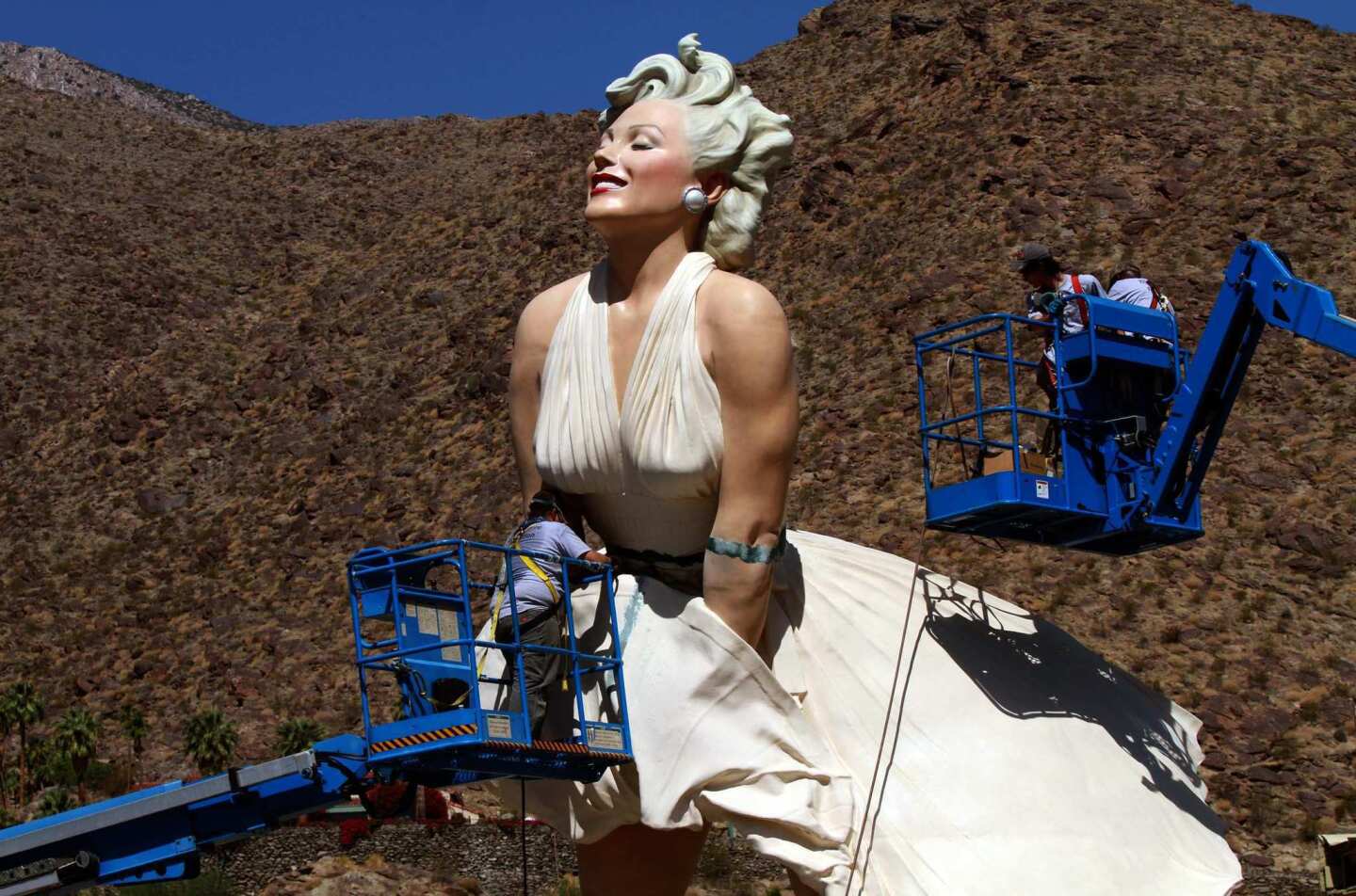 A 26-foot-tall statue of Marilyn Monroe stands in downtown Palm Springs at the corner of Tahquitz Canyon Way and Palm Canyon Drive.