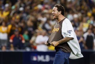 San Diego, CA - October 15: Former San Diego Padres pitcher Jake Peavy reacts after the first pitch before game 4 of the NLDS against the Los Angeles Dodgers at Petco Park on Saturday, Oct. 15, 2022 in San Diego, CA. (K.C. Alfred / The San Diego Union-Tribune)
