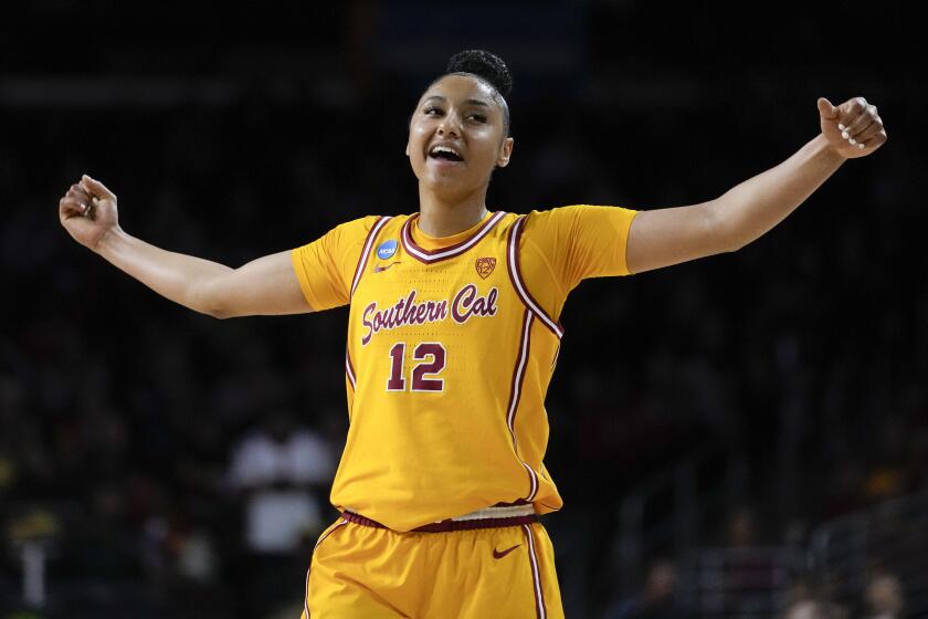 Southern California guard JuJu Watkins reacts after a shot during a second-round college basketball game against Kansas in the women's NCAA Tournament in Los Angeles, Monday, March 25, 2024. (AP Photo/Ashley Landis)