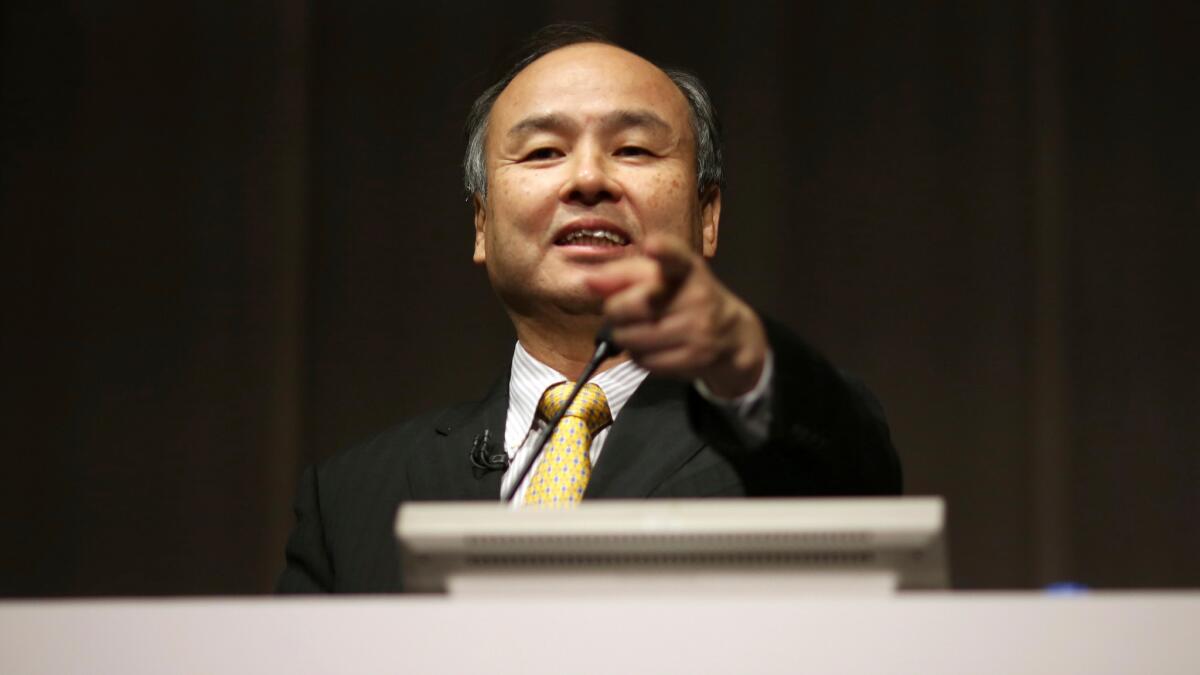 SoftBank founder and Chief Executive Masayoshi Son addresses a news conference in Tokyo in 2014. Japanese technology company SoftBank Group Corp. is buying British semiconductor company ARM Holdings for $31 billion.