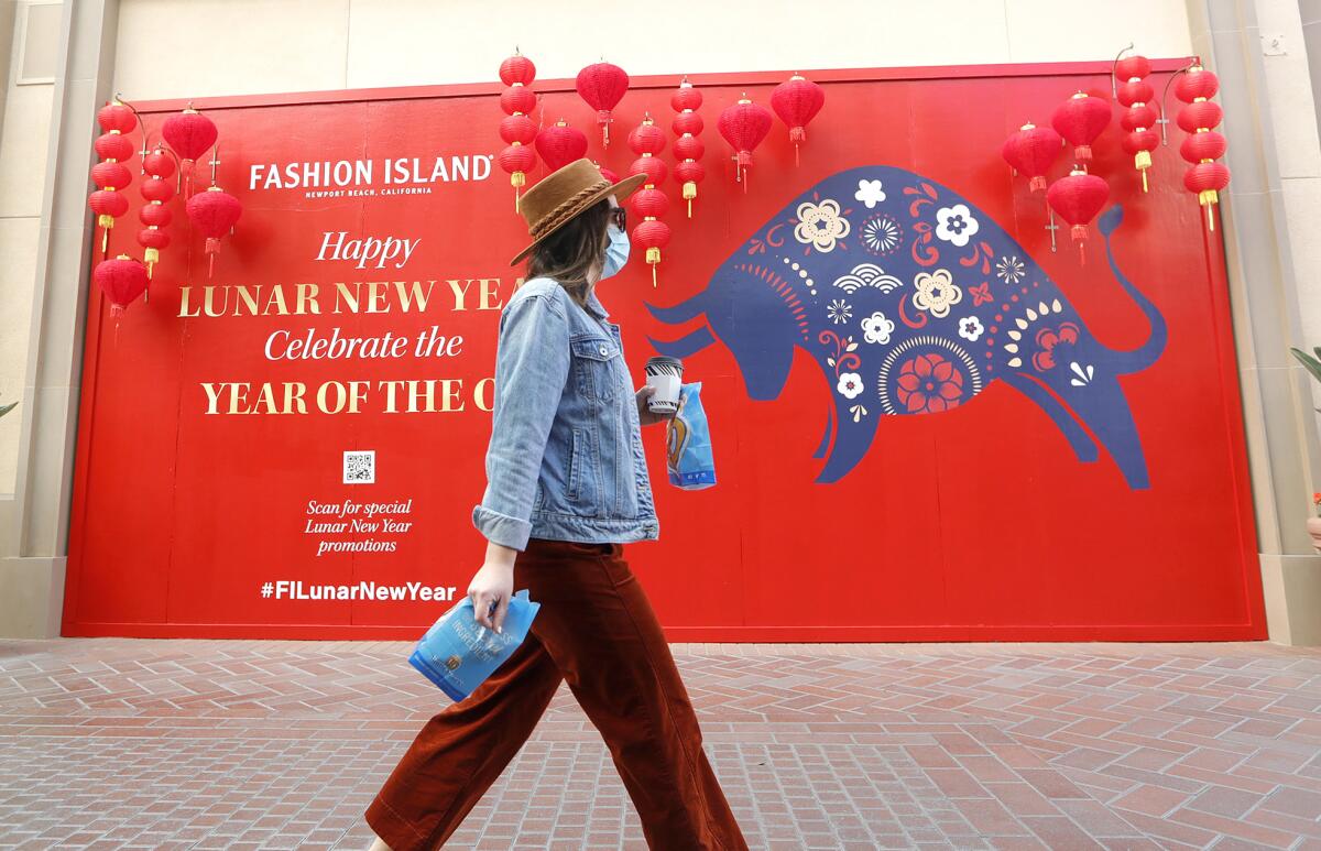 A shopper at Fashion Island earlier this year.