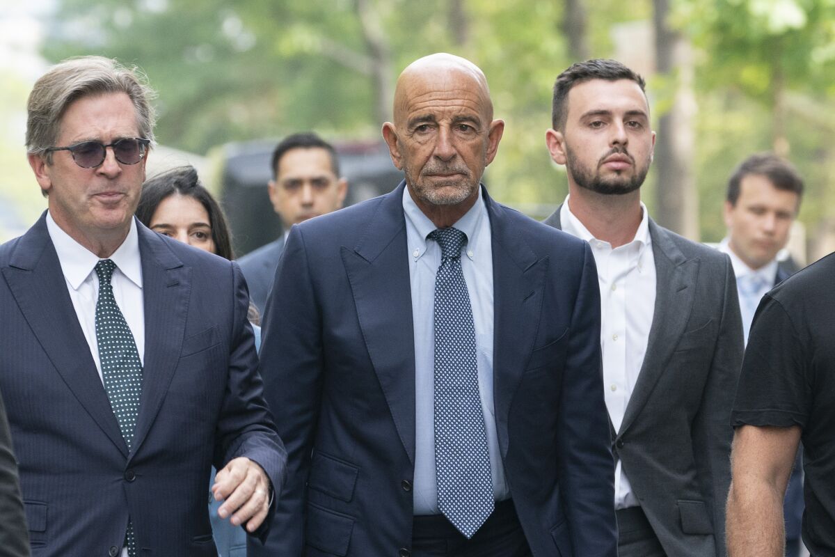 Tom Barrack, center, arrives at Brooklyn federal court in New York 