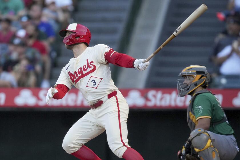 Taylor Ward hits a two-run home run during the Angels' 5-1 win over the Oakland Athletics at Angel Stadium.