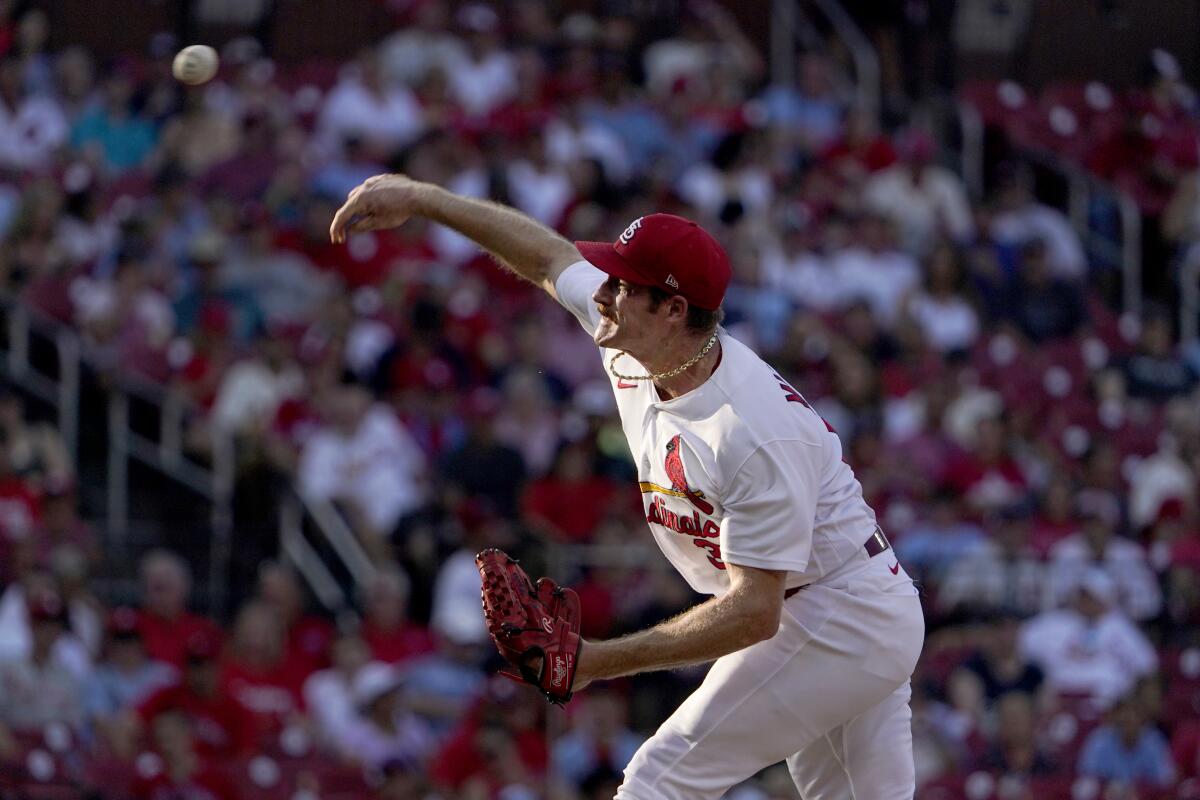St. Louis Cardinals starting pitcher Miles Mikolas throws during the first inning of a baseball game against the Philadelphia Phillies Monday, July 11, 2022, in St. Louis. (AP Photo/Jeff Roberson)