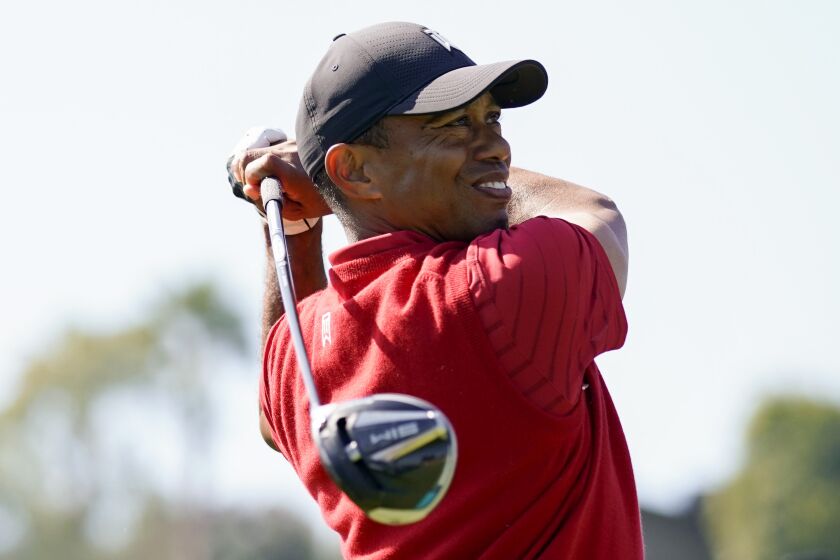 Tiger Woods tees off on the 18th hole during the final round of the Genesis Invitational golf tournament at Riviera Country Club, Sunday, Feb. 16, 2020, in the Pacific Palisades area of Los Angeles. (AP Photo/Ryan Kang)