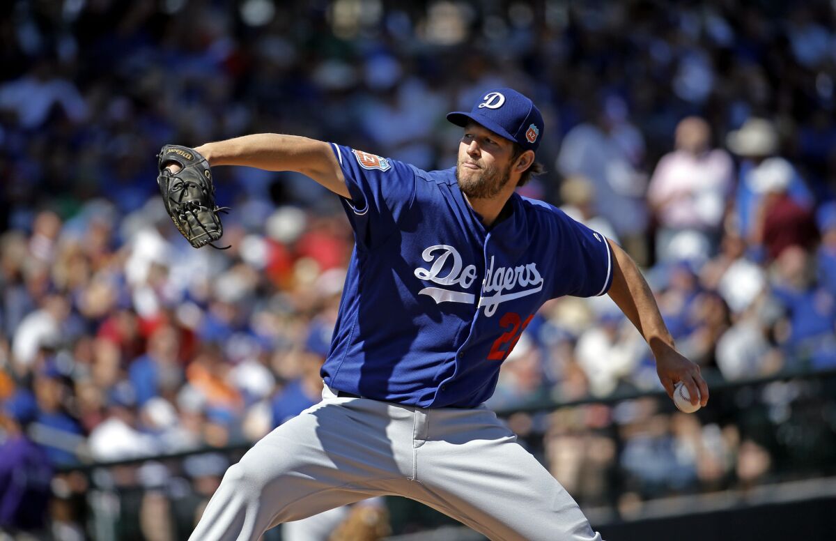 Clayton Kershaw throws during the first inning of a spring training game against the Chicago Cubs on March 8.