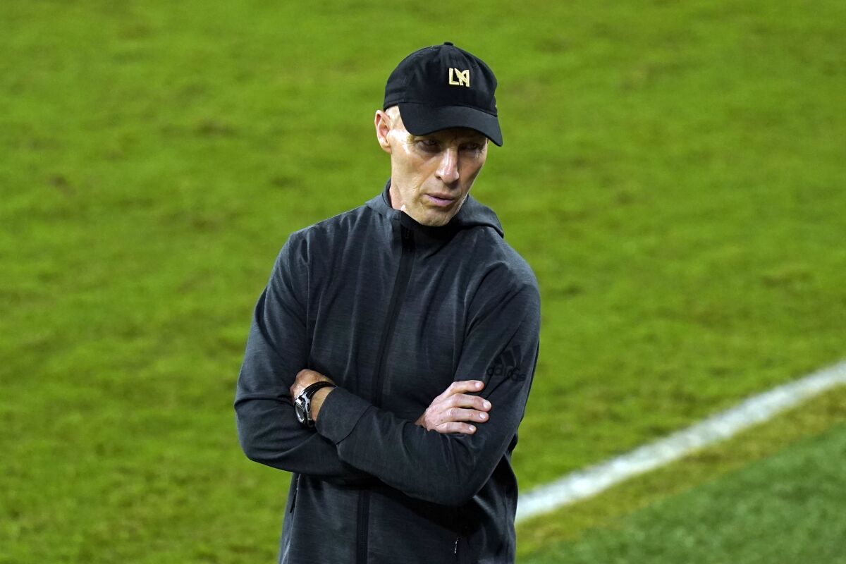 LAFC coach Bob Bradley stands on the sideline during a CONCACAF Champions League match on Dec. 16, 2020.