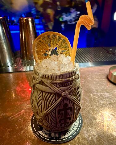 A Painkiller cocktail in a tiki-style mug at Strong Water in Anaheim.