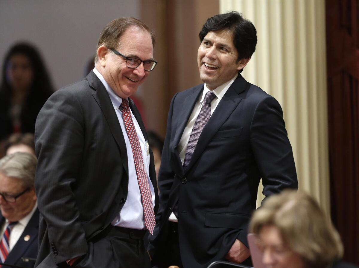 Senate President Kevin de León (D-Los Angeles), right, and Senate Republican leader Bob Huff of San Dimas on the Senate floor last week. Both senators supported a resolution Monday asking the Supreme Court not to alter the legal principal of 'one person, one vote.'