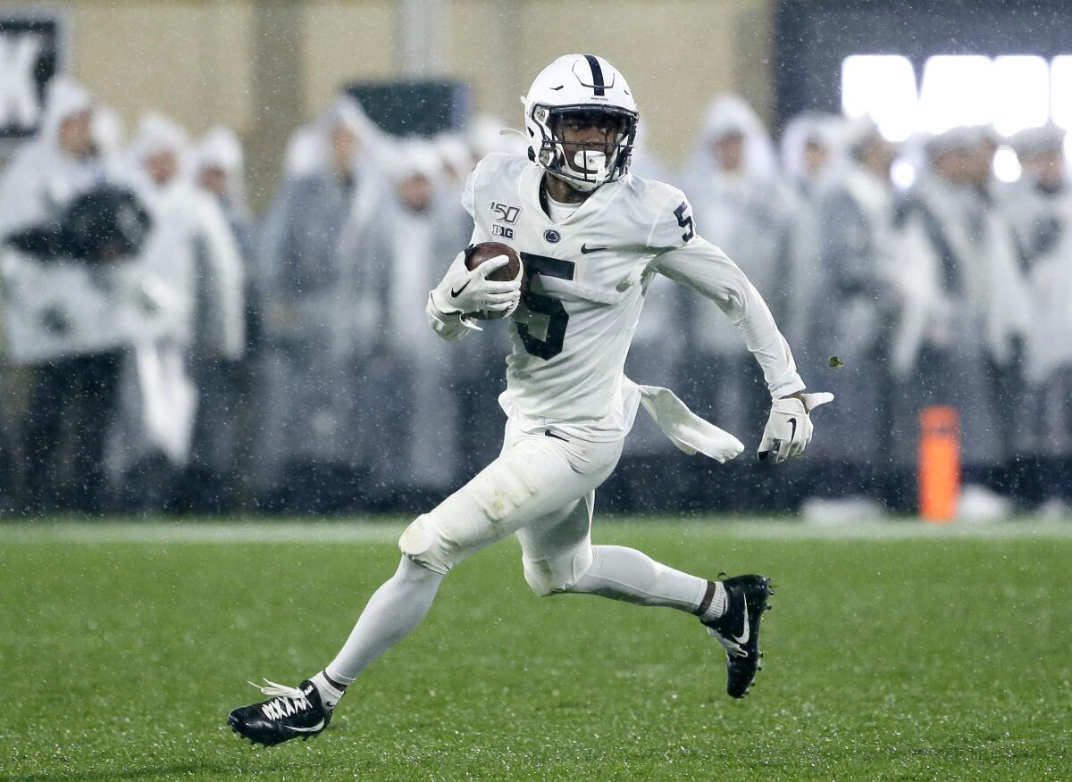 Penn State receiver Jahan Dotson returns a punt against Michigan State Spartans during the second half of a game Oct. 26 at Spartan Stadium.