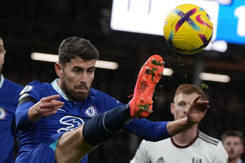 Chelsea's Jorginho shots the ball during the English Premier League soccer match between Fulham and Chelsea at the Craven Cottage stadium in London Thursday, Jan. 12, 2023. (AP Photo/Alastair Grant)