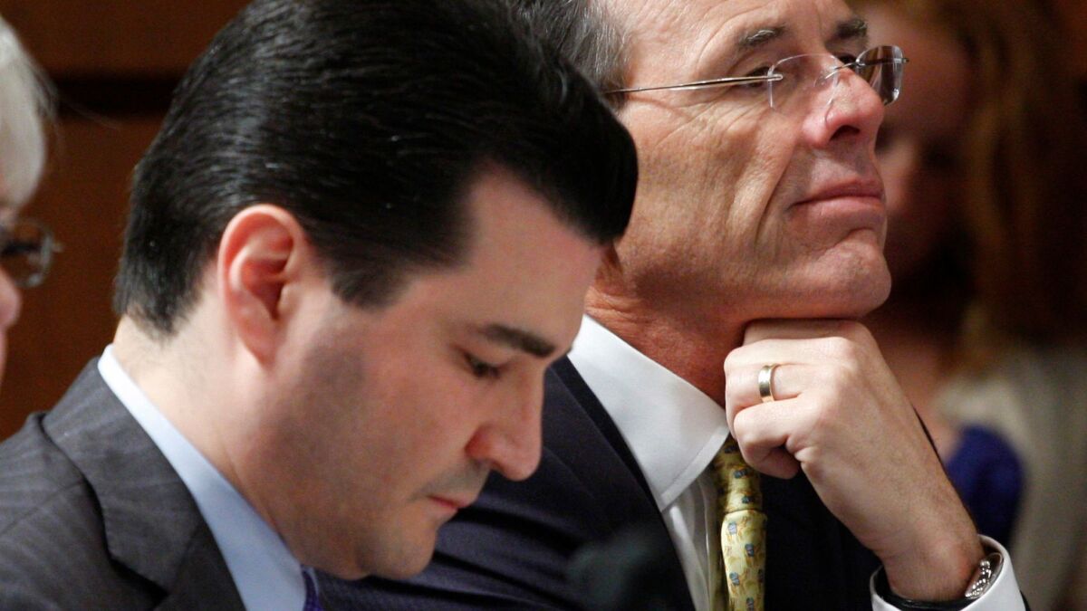 Scott Gottlieb, left, is seen on Capitol Hill in Washington in 2009.