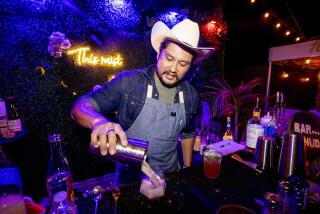 Bartender Bryant Joel Orozco of Long Beach, makes a non-alcoholic drink
