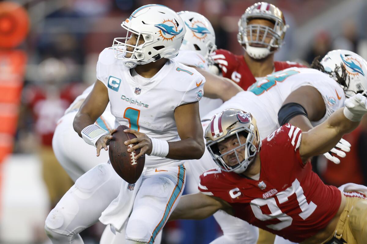 49ers dolphins spread