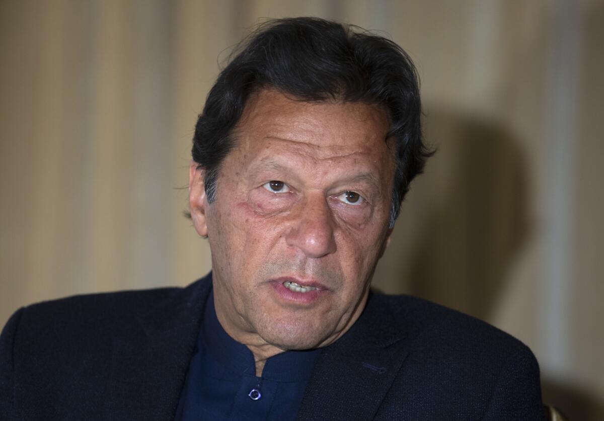 FILE - In this March 16, 2020 file photo, Prime Minister Imran Khan speaks during an interview in Islamabad, Pakistan. Khan will seek a vote of confidence from the National Assembly later this week to prove he enjoys the support of majority in lower house of the parliament despite the defeat of his ruling party's key candidate in the Senate's elections a day before, a Cabinet minister said, Thursday, March 4, 2021. (AP Photo/B.K. Bangash)