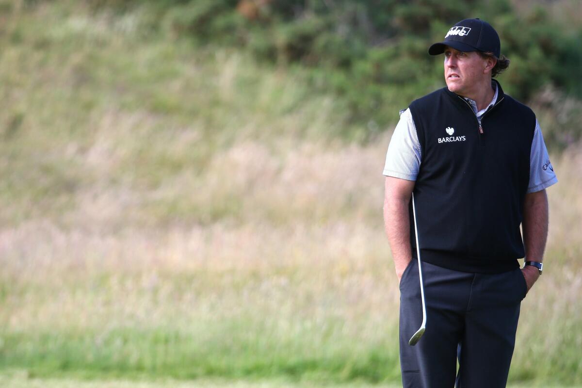 Phil Mickelson looks on from 17th green on Friday during the second round of the 144th Open Championship at The Old Course in St. Andrews, Scotland.