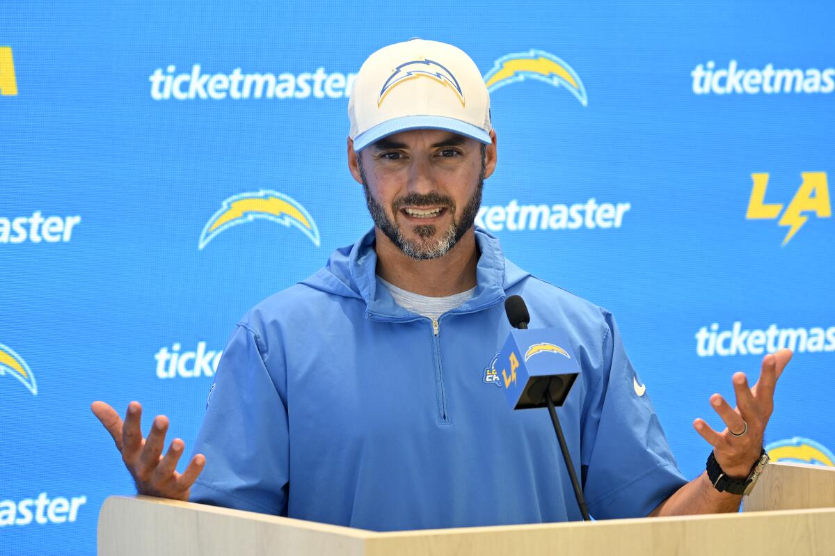  Chargers defensive coordinator Jesse Minter speaks at a news conference.