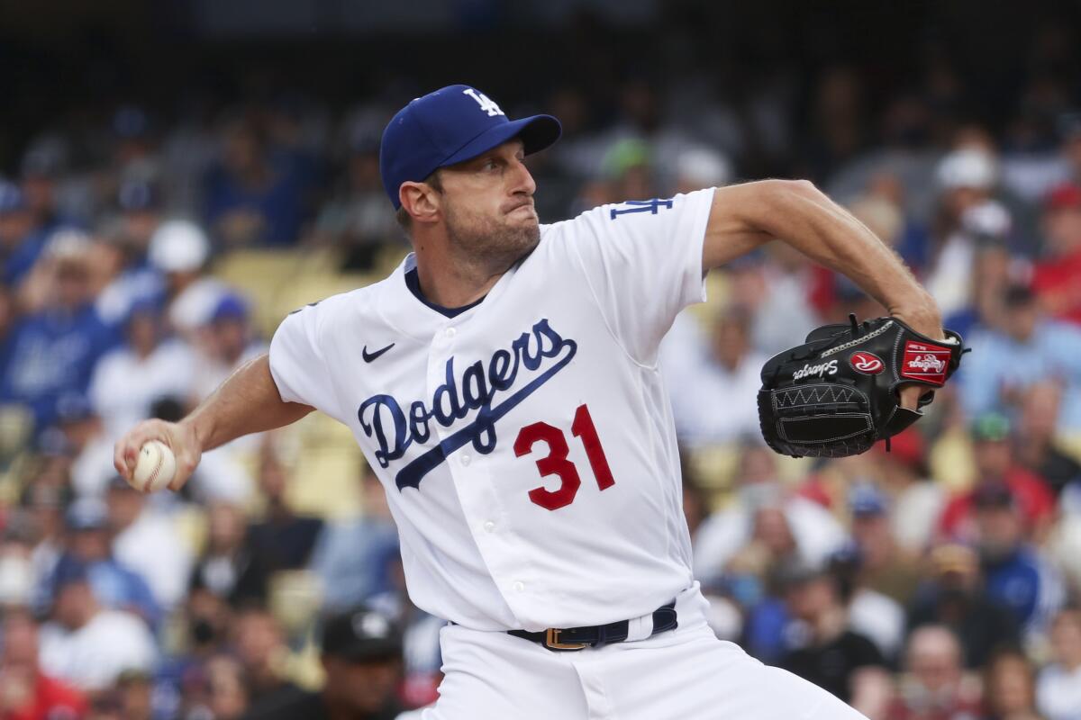 Dodgers pitcher Max Scherzer delivers against the St. Louis Cardinals on Wednesday.