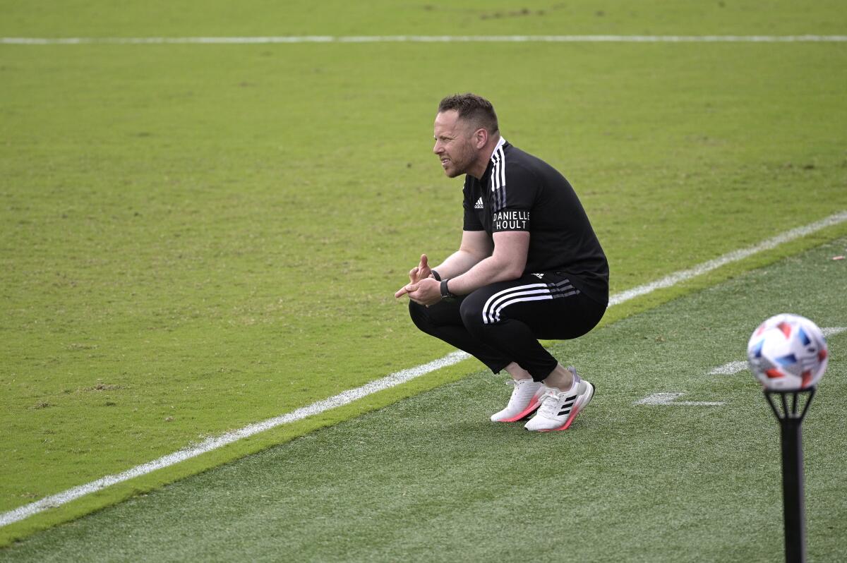 Vancouver Whitecaps head coach Marc Dos Santos watches a match from the sideline