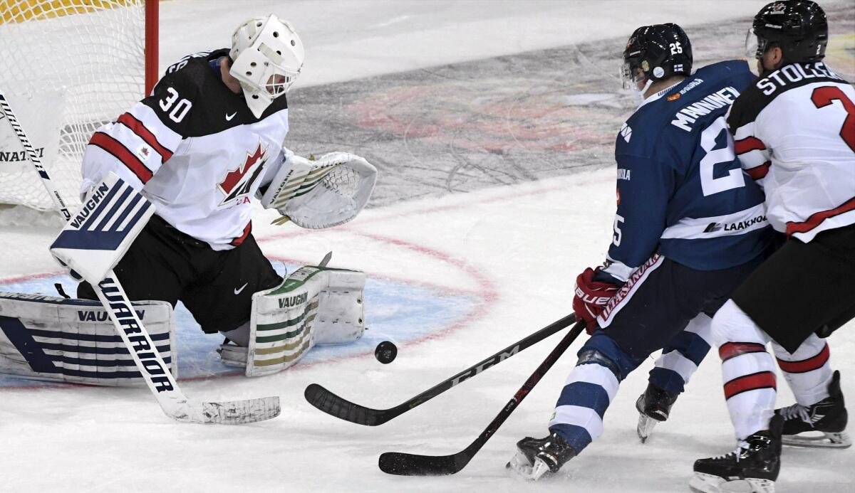 Canada's Ben Scrivens makes a save on a shot by Finland's Sakari Manninen on Nov. 12.