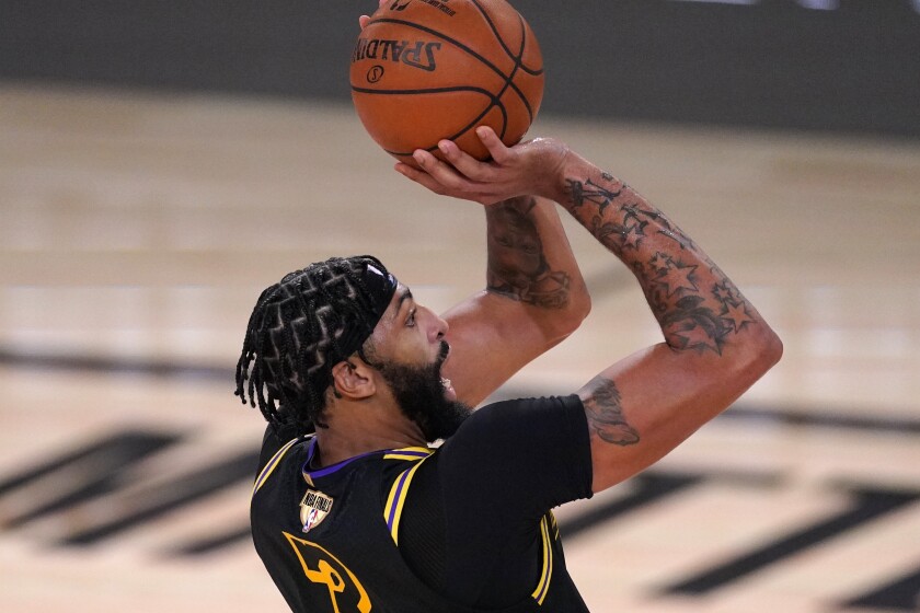 Lakers forward Anthony Davis lines up a shot during Game 2.