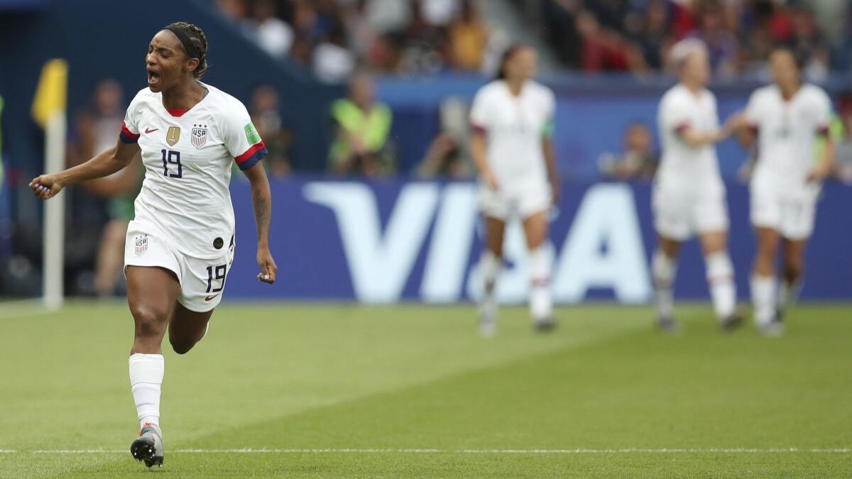 United States' Crystal Dunn celebrates after the U.S. scored the opening goal during the Women's World Cup quarterfinal match against France in Paris on Friday.