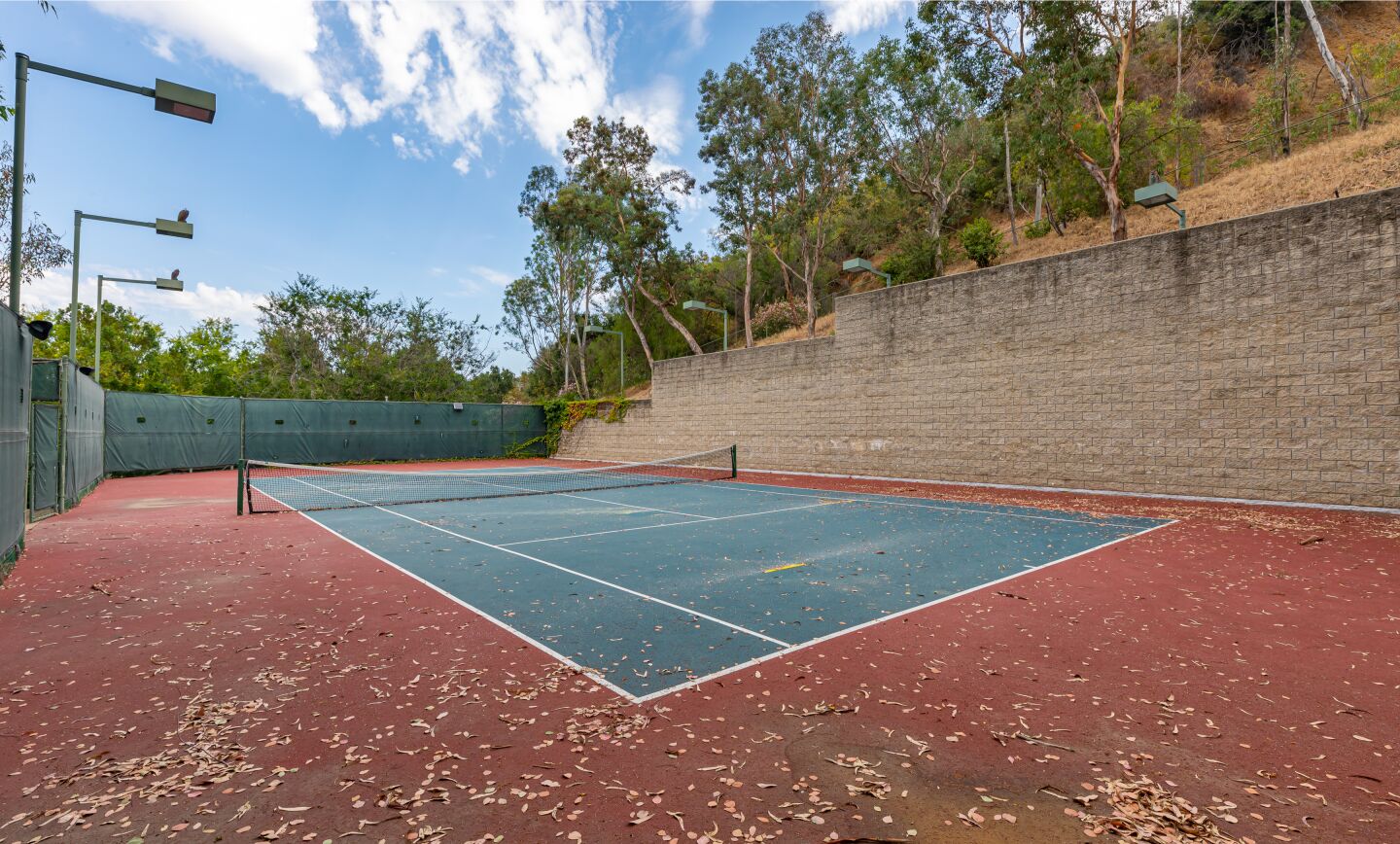 The tennis court.