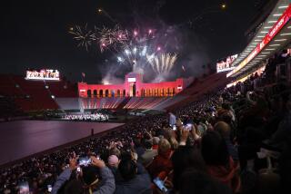 LOS ANGELES, CA - MAY 9, 2024: Fireworks go off at the "Trojan Family Graduate Celebration," at The Coliseum on May 9, 2024 in Los Angeles, California. The traditional main stage ceremony at Alumni Park was canceled due to campus unrest. (Gina Ferazzi / Los Angeles Times)