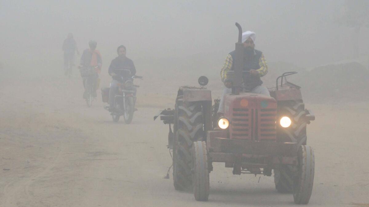 Heavy smog and fog conditions also reached the outskirts of Amritsar, a city in northwestern India.